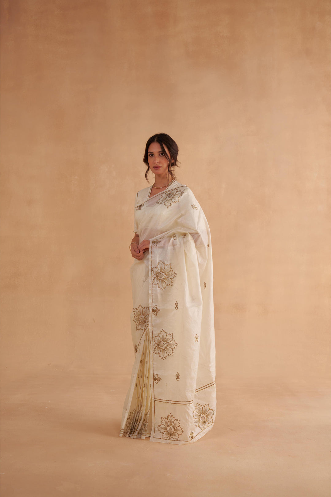 Vintage Ivory Tussar Saree with Gold Zardozi Embroidery and Paper Tussar blouse with Zari Embroidery