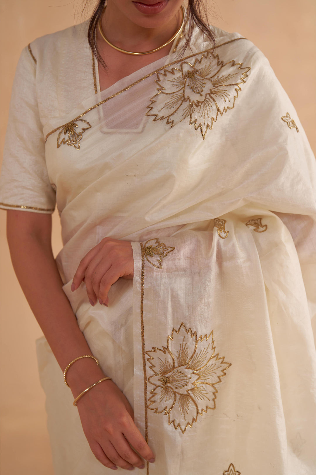 Vintage Ivory Tussar Saree with Gold Zardozi Embroidery and Paper Tussar blouse with Zari Embroidery
